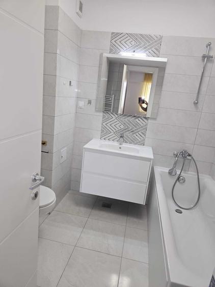Apartament cu o camera si loc de parcare in cladire - Fara garantie - 6