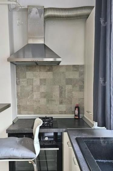 Apartament cu 2 camere semidecomandat, mobilat în Regie