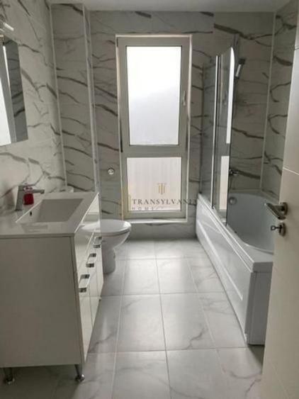 Apartament cu 3 camere semidecomandat, mobilat în Central