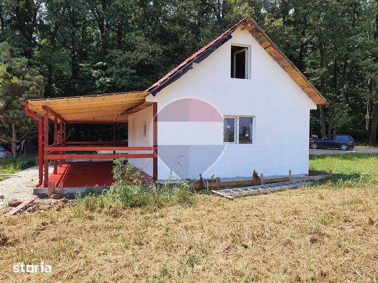 Casă cu 4 camere cu Teren 1000 Mp în Periș