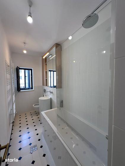 Apartament cu 3 camere în Romană