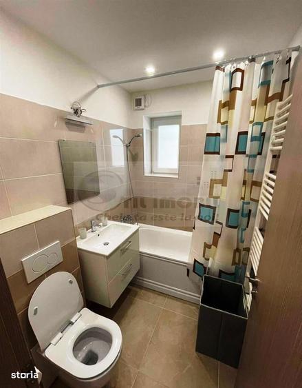 Apartament cu 2 camere semidecomandat, mobilat în Podu Roș