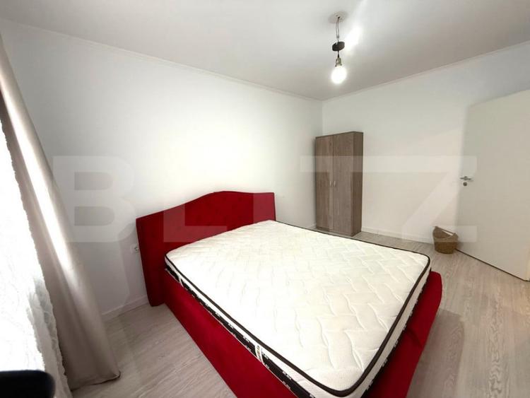 Apartament cu 2 camere semidecomandat în Chinteni