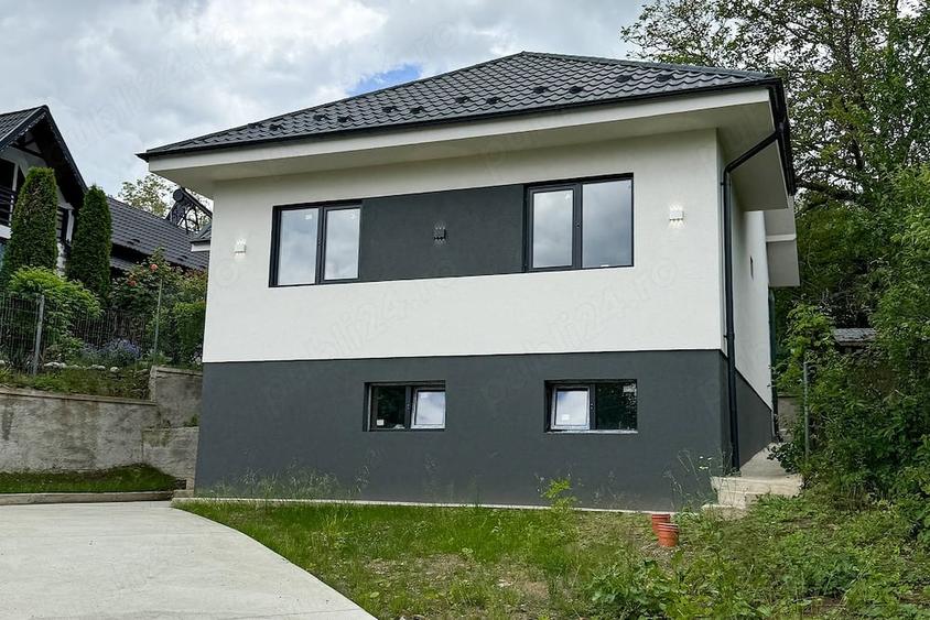 Casă cu Teren 1300 Mp în Teișani