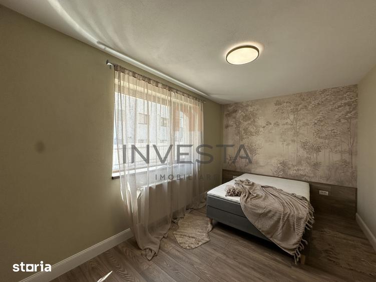 Apartament cu 3 camere semidecomandat în Borhanci