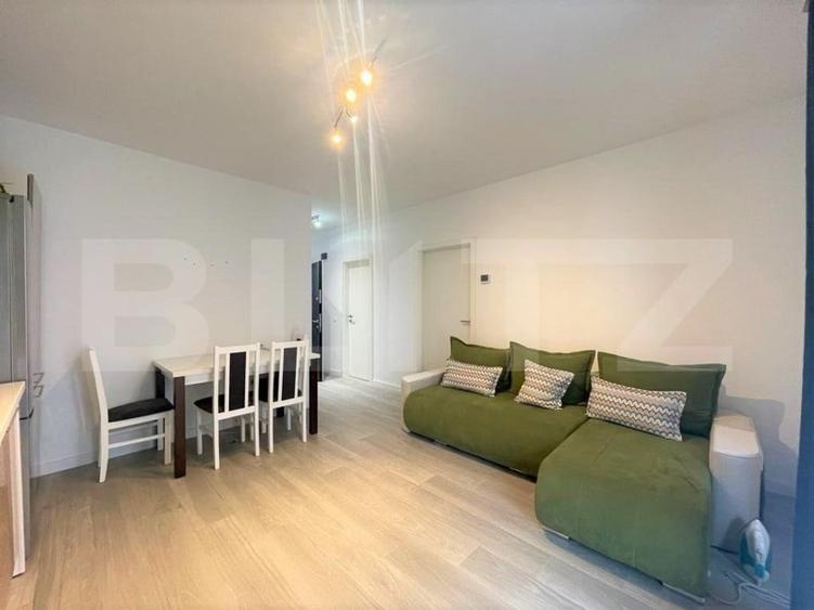 Apartament cu 2 camere semidecomandat, mobilat în Chinteni