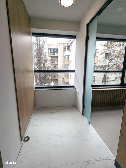 Apartament cu 3 camere semidecomandat în Dorobanți