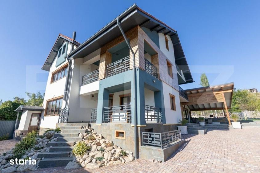 Casă cu 8 camere cu Teren 1600 Mp în Răzvad