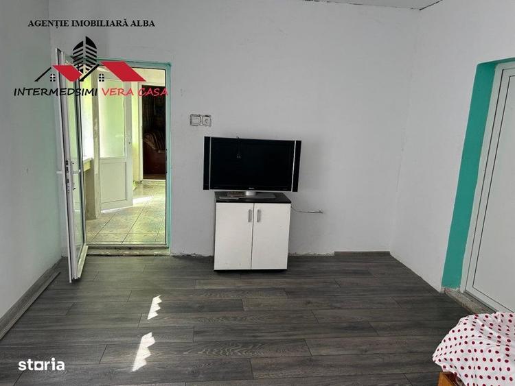 Casă cu 4 camere în Teiu