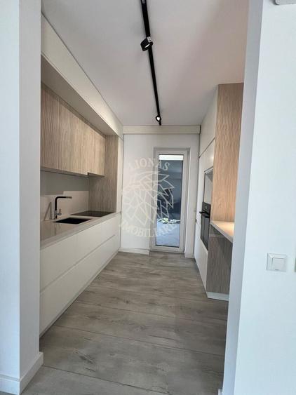 Apartament cu 2 camere semidecomandat, mobilat în Calea Moldovei