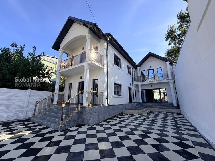 Casă individuală cu 7 camere cu Canalizare în Vitan