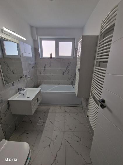Casă cu 4 camere cu Teren 80 Mp în Titan