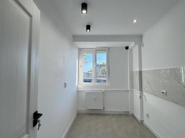 Apartament cu 2 camere, mobilat în P-ța Victoriei
