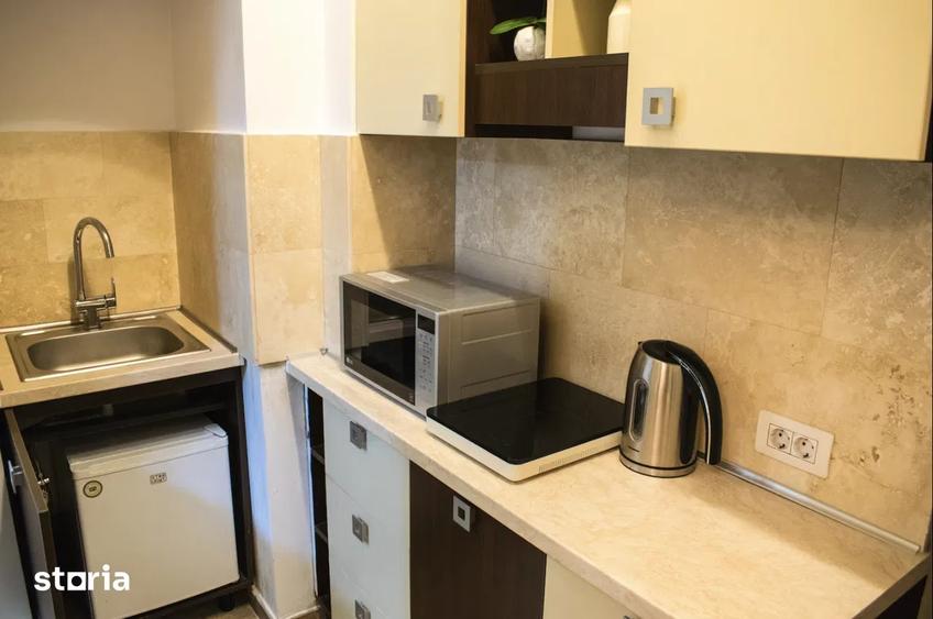 Apartament cu 2 camere semidecomandat, mobilat în P-ța Romană
