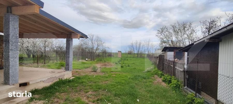 Casă cu Teren 1000 Mp în Ulmi
