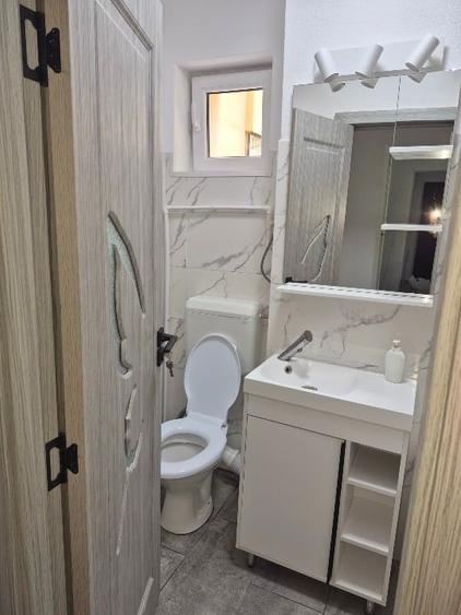 Apartament cu 2 camere semidecomandat în Botizului