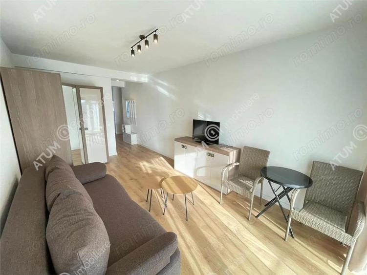 Garsoniera decomandata etaj 1 cu balcon si loc parcare in zona de Vest - 2