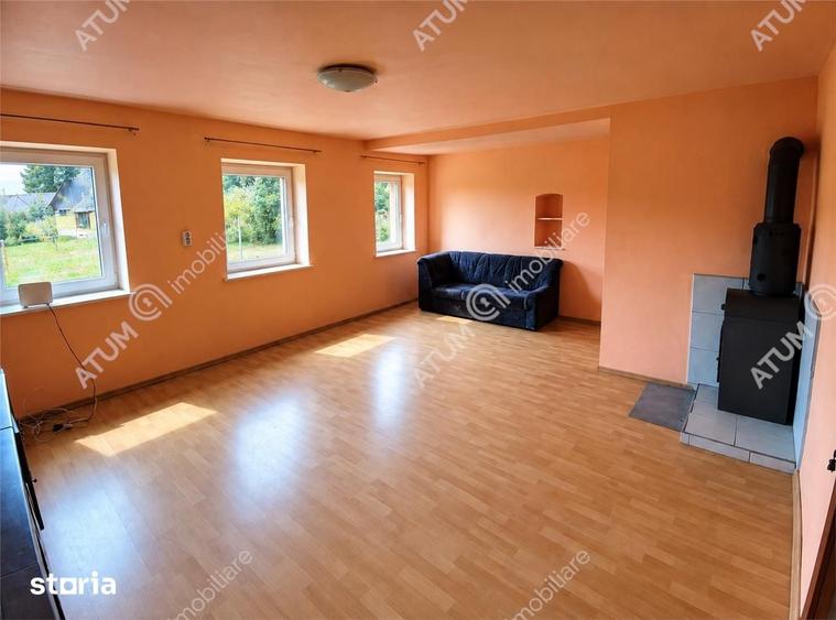 Casă cu 4 camere decomandat cu Teren 1650 Mp în Porumbacu de Jos