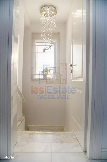 Casa intr-o zona linistita cu garaj si teren-1091 mp - 10