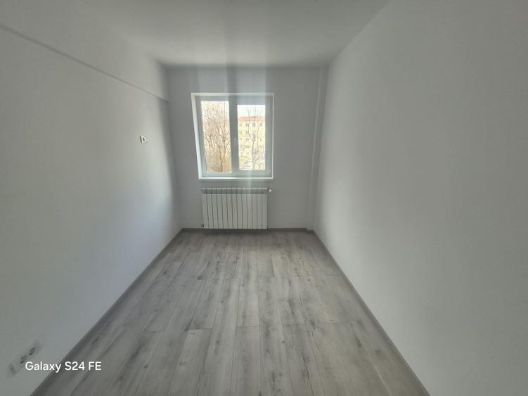 De închiriat apartament 3 camere etaj 1 - 1