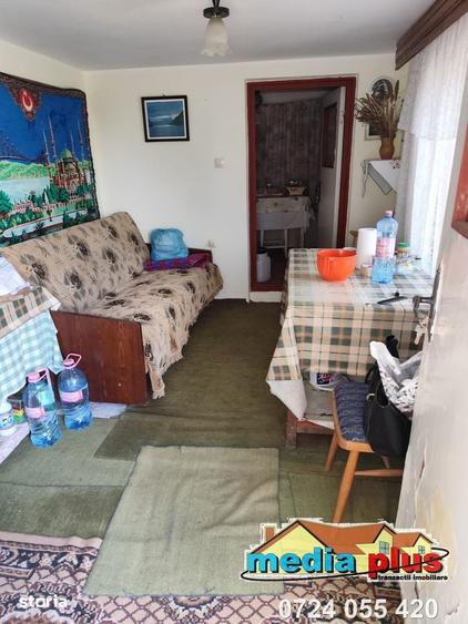 Casa cu teren 1374 mp in vatra veche a comunei Vanatori 56.000 Euro - 5