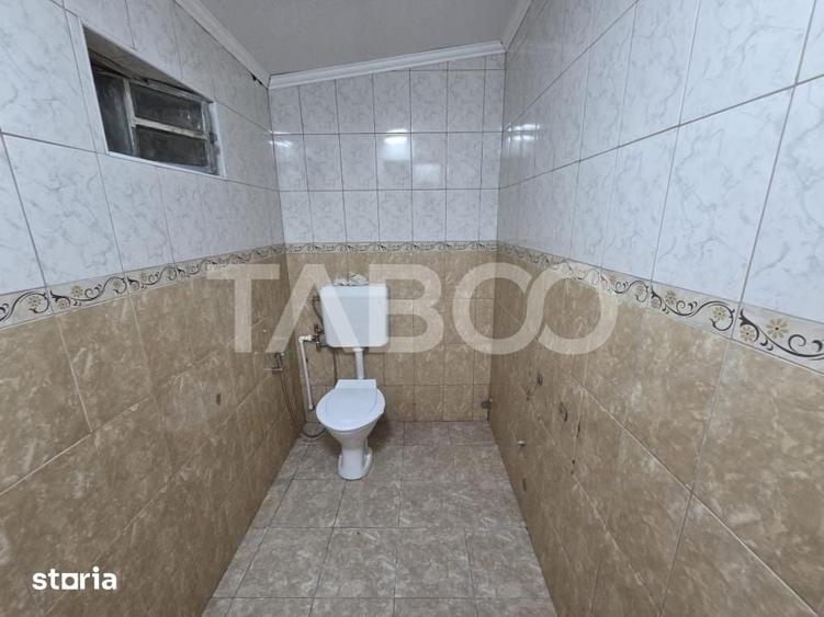 Casă cu 4 camere cu Teren 200 Mp în Central