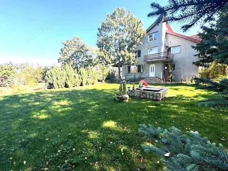 Casa S+P+1E+M pe un teren de 1430 mp in Coteana - 14