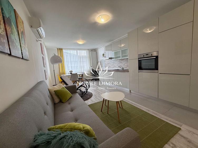Apartament cu 2 camere semidecomandat, mobilat în Central