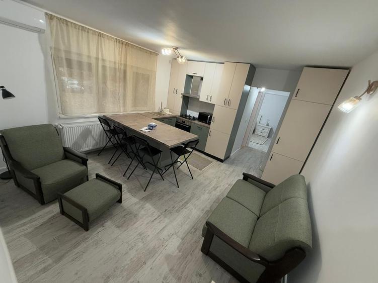 Apartament cu 2 camere semidecomandat, mobilat în Micălaca