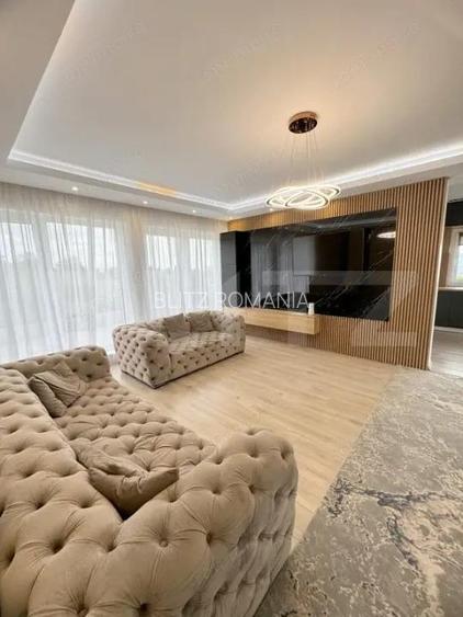Casa INDIVIDUALA , 2 locuri de parcare , gradina amenajata , LUX