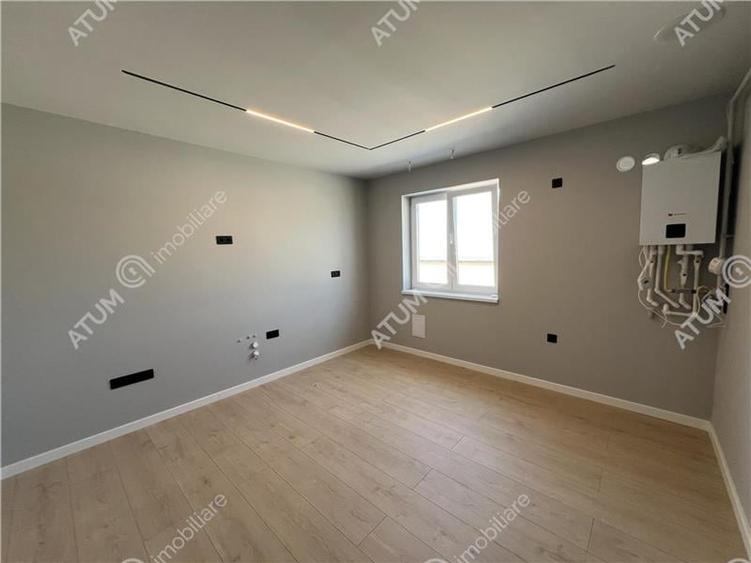 Penthouse cu 3 camere 2 bai si 2 terase zona Calea Surii Mici din Sibi - 12