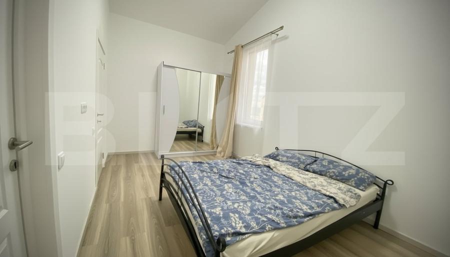 Casa pe calcan cu priveliste superba si compartimentare deosebita - 13