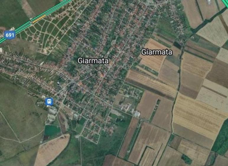 Giarmata- teren intravilan- 2 fronturi stradale - 961 mp - 1