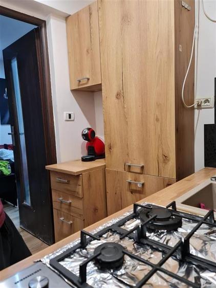 Garsoniera cu centrala la parter zona Buziasului - 9