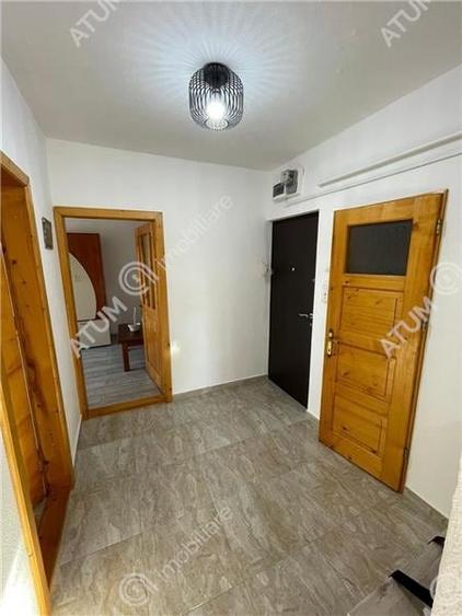 Apartament renovat cu 3 camere decomandate in Cisnadie Sibiu - 12