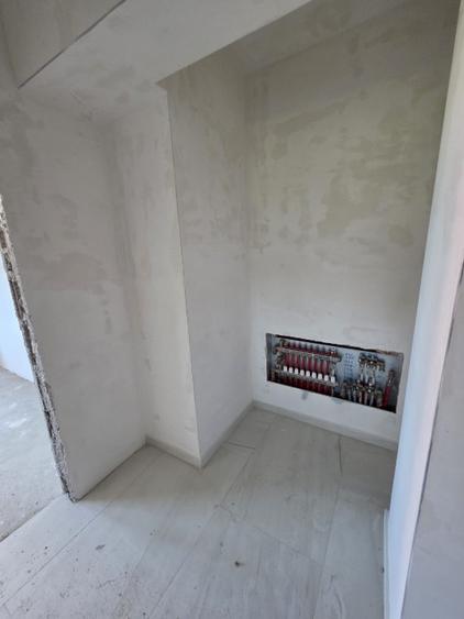 BLOC NOU apartament cu 2 camere 63.35m² de vanzare, ZONA CENTRALA Podu Ros- Bld. - 11
