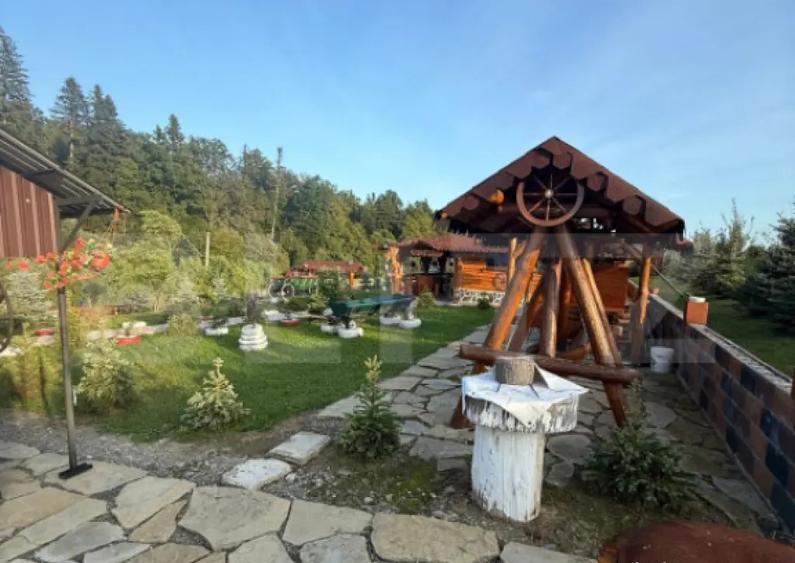 Cabana din lemn rotund, 2 camere, 140 mp, teren 2800 mp, Pal - 4