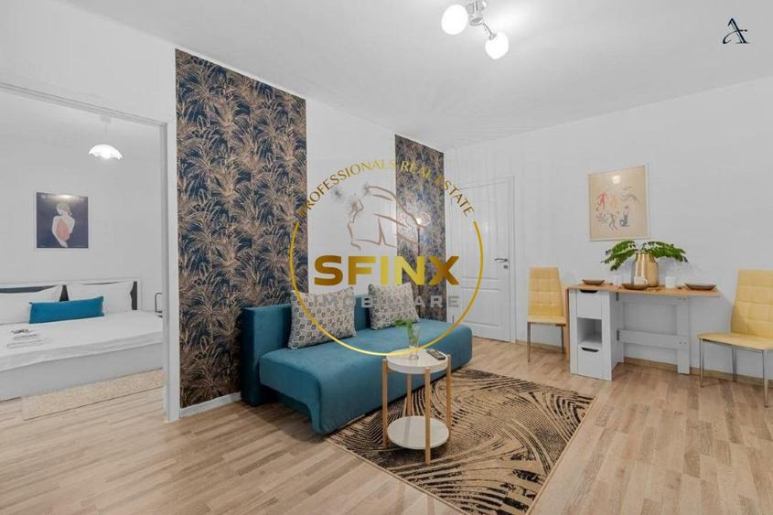 Apartament cu 3 camere semidecomandat, mobilat în P-ța Victoriei
