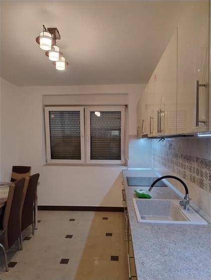 RECO Apartament cu 3 camere in Beius - 1