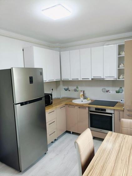 Garsoniera decomandata 46mp utili + loc de parcare subteran zona Tractorul - 3