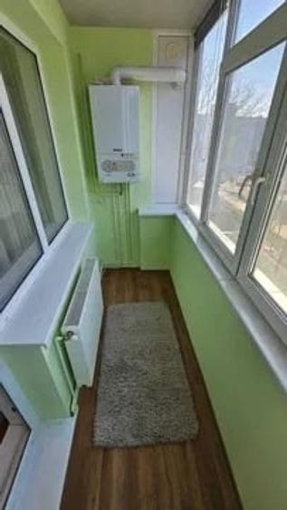 Apartament cu 2 camere semidecomandat, mobilat în Podu Roș