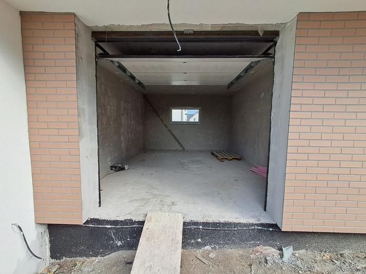 Casa cuplata prin garaj 23 mp, sup. totala 147 mp P+E in Chinteni - 3