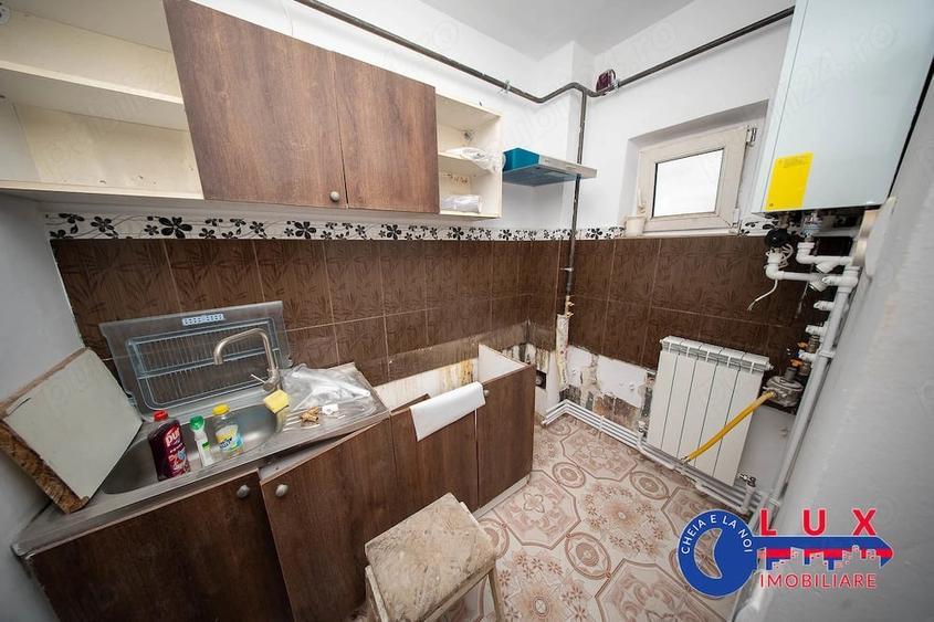 ID 59 DE INCHIRIAT: Garsoniera confort 1 - 7