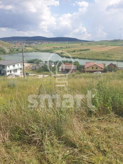 Teren pentru constructie , Chinteni, zona Lacurilor, front la 2 strazi - 3