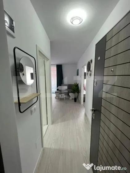 Apartament cu 2 camere semidecomandat în Chinteni