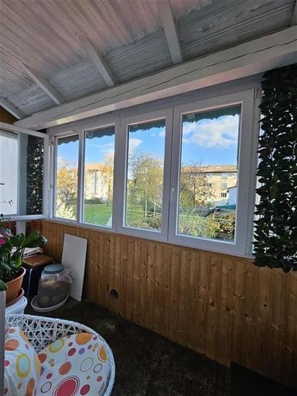 Apartament cu GRADINA SI ACOPERIS  MANSARDA DE VANZARE IN ONESTI ETJ 1 - 2