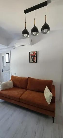 Apartament cu 2 camere semidecomandat, mobilat în Central