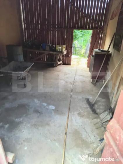 Casă cu 2 camere cu Teren 1400 Mp în Central