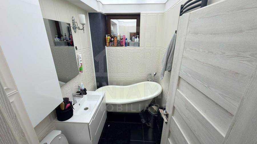 Apartament cu 2 camere semidecomandat, mobilat în Cornitoiu