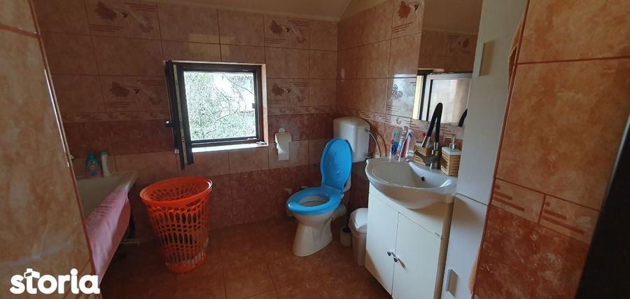 Casă cu 5 camere cu Teren 500 Mp în Ronaț